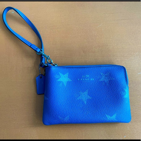 Coach Handbags - Coach- wristlet with faded star detail- blue